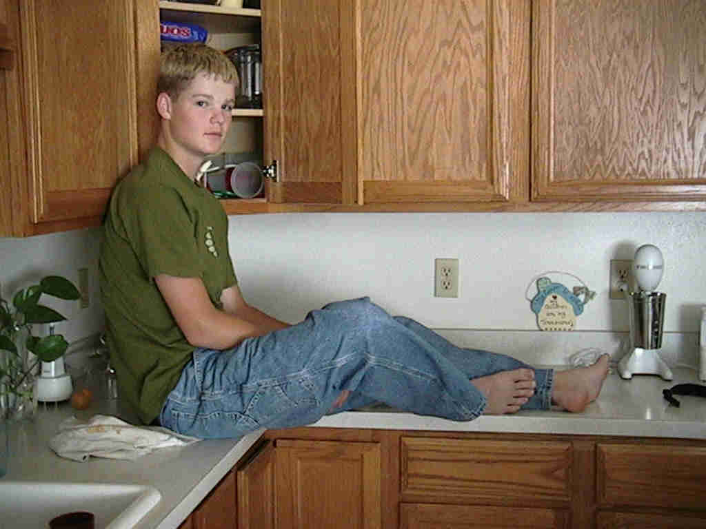 July 2002 - Michael relaxing in the kitchen