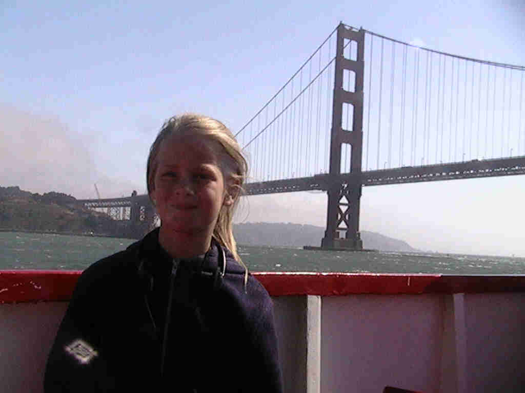 Julie enjoying the boat ride by the Golden Gate Bridge